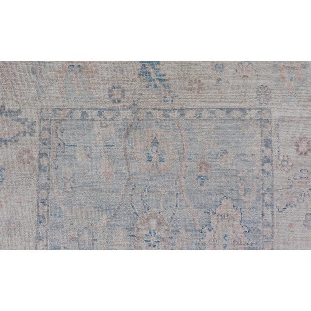 Cream Modern Tribal Oushak With a Cream Border and Light Gray-Blue Background 4'0 X 6'2 For Sale - Image 8 of 12