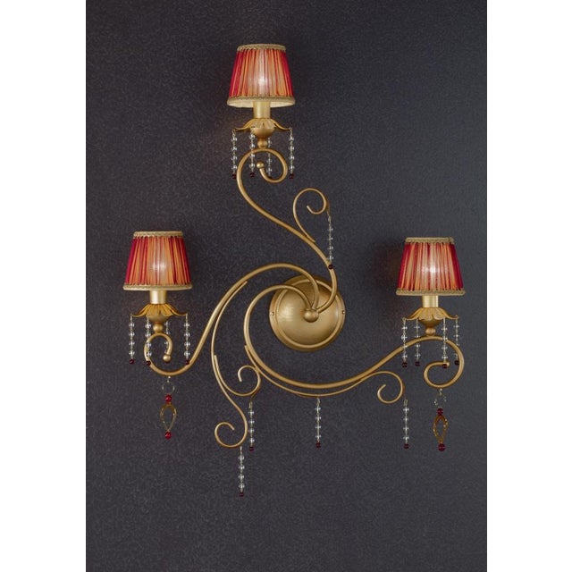 Fenice gold 3 lights wall sconce in montecarlo gold and cut glass by aggiolight. Dimensions: w 59 x d 12 x h 63 cm....