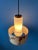 Danish opaline glass pendant light with textile jungle patterned shade. The glow emitted from the milk glass nicely...