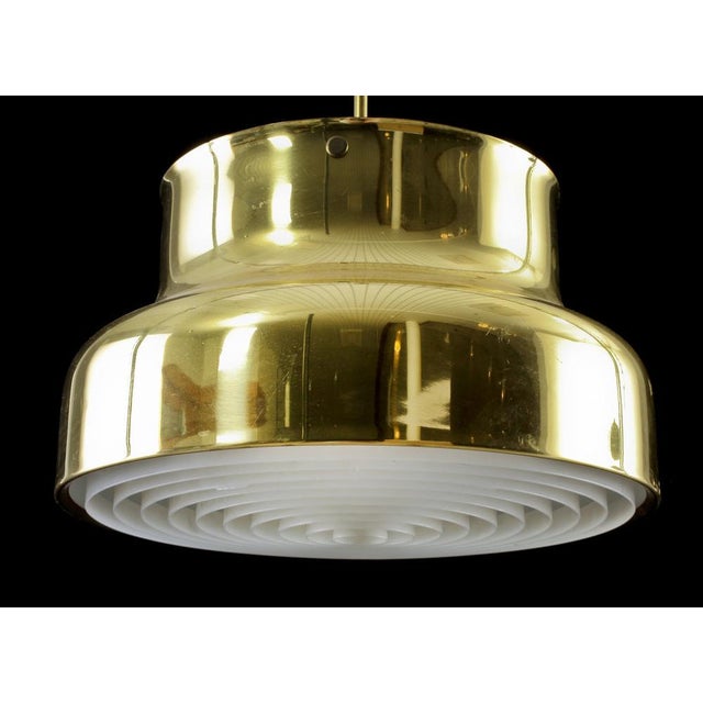 Bumling" hanging lamp in brass & acrylic by Anders Pehrson for Lyktan, Sweden, 1970s. Good condition. Adjustable height. 4...