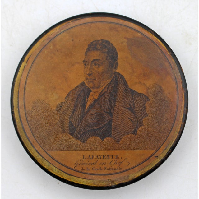 Circa 1830s papier mache Lafayette portrait snuff box, American or French. Transfer print portrait of Lafayette among the...