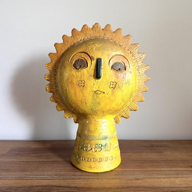 A striking vintage ceramic sun sculpture by Aldo Londi for Bitossi, created in Italy for Rosenthal-Netter. The rich yellow...