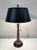 Beautifully detailed lamp: brass palm tree body, wood base, black tole shade and brass acorn finial. Each chain operates...
