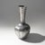 A Bellotti pewter vase from the 1920s, characterised by a composition that reflects the gradual transition from the...