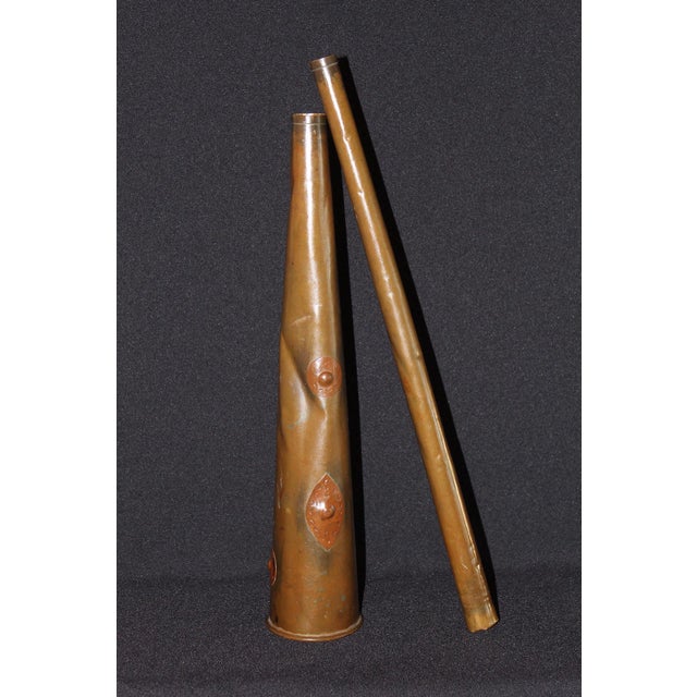 Striking antique handcrafted copper horn-form vessel featuring a tall, tapered silhouette and a removable elongated tube....
