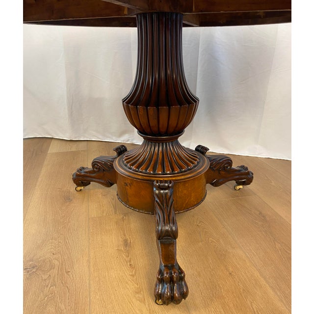 19th Century French Charles X Style Flame Mahogany Guéridon Table with Breccia Marble Top An exceptional 19th-Century...
