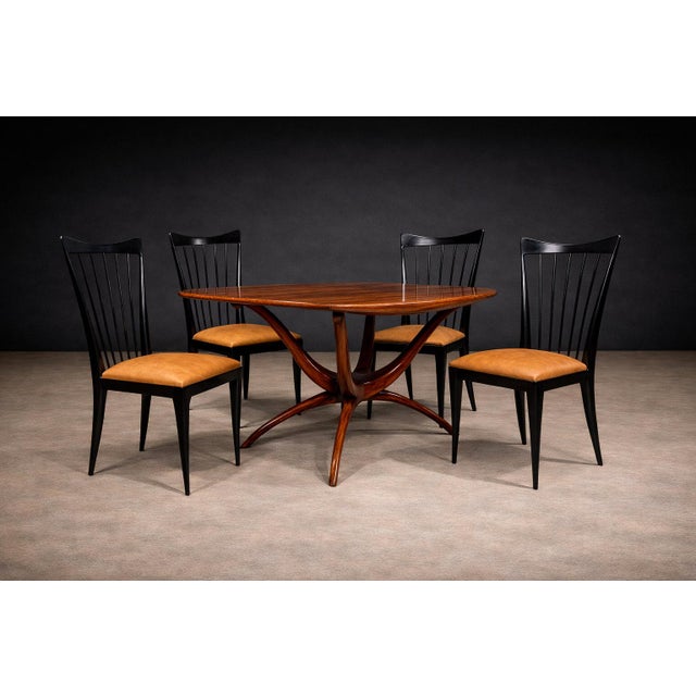 Designed by Giuseppe Scapinelli (1891–1982) in the 1950s, this set of eight dining chairs reflects the designer’s...