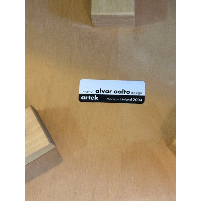 Contemporary Pair - Artet Alvar Aalto Original Design - Three Legged Stool Model 60 - Honey Stained - 2004 For Sale - Image 3 of 6