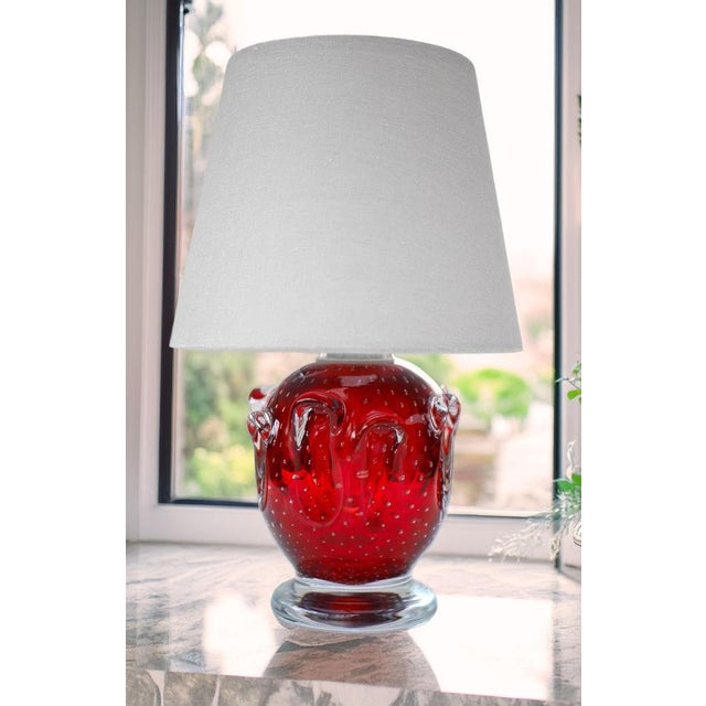A stunning bright red mid-century modern crystal lamp made by the talented börne augustsson for åseda, sweden during the...