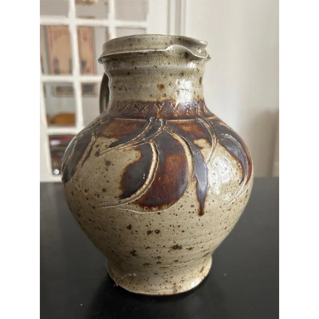 Beautifully sized pyrite stoneware pitcher made by Alain Magne in La Borne. This piece has an attribution mark, I am sure...