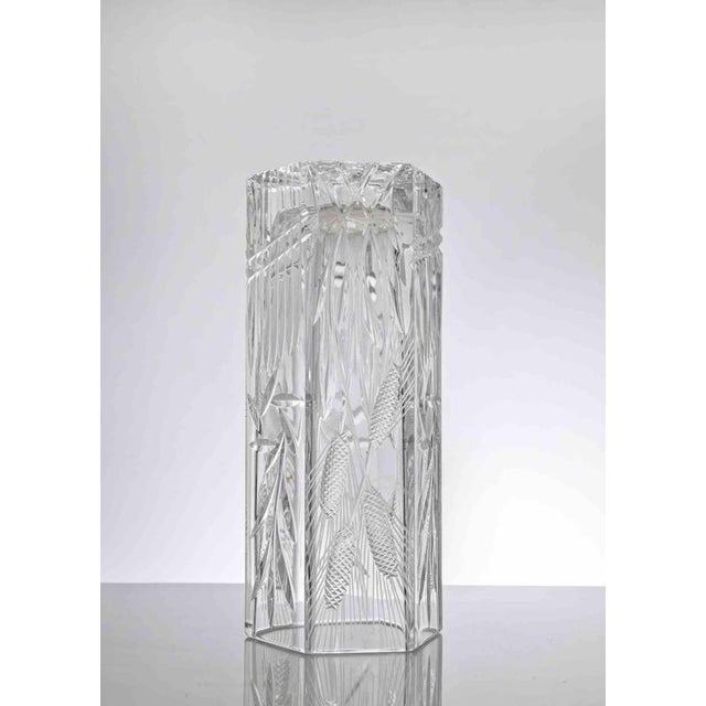 Vintage crystal vase realized by a european manufacture in 1970s. Decorative motifs with spikes. Very good condition.