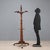 Walnut coat stand with umbrella stand and walking stick holder. Italy, late 19th century. This piece is attributed to the...