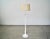 Vintage 1960's Hollywood Regency floor lamp for sale. Made of solid wood, and has a white shabby chic finish. It was...