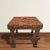 A wonderful early 20th Century English Arts & Crafts period oak stool with its original woven leather top with brass...