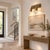 Bring warm architectural lighting to the bathroom, vanity, bedroom, or hallway with this handcrafted brass 2-light...