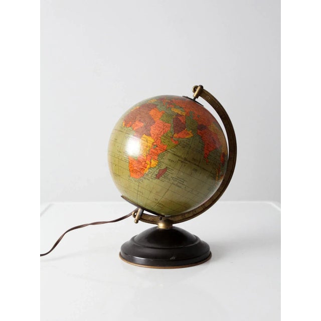 This authentic Replogle illuminated globe dates to 1949 and is offered from our Heritage Collection. Measuring 8 inches in...