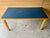Iconic bent leg birch table with original blue linoleum top by renowned Finnish designer Alvar Aalto circa 1950. No...