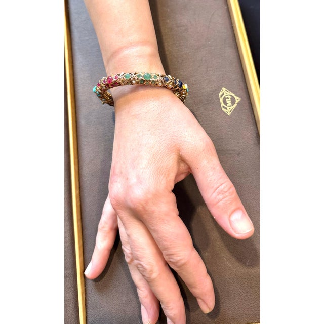 Vintage Natural Turquoise Emerald Ruby Sapphire pearl Bangle in 14 Kt Yellow Gold 41 Gm A Vintage bangle bracelet from our...