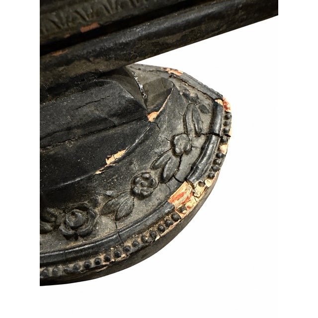 Victorian-period tabletop frame featuring raised roses, foliage, and beaded detailing in a black finish. A decorative...