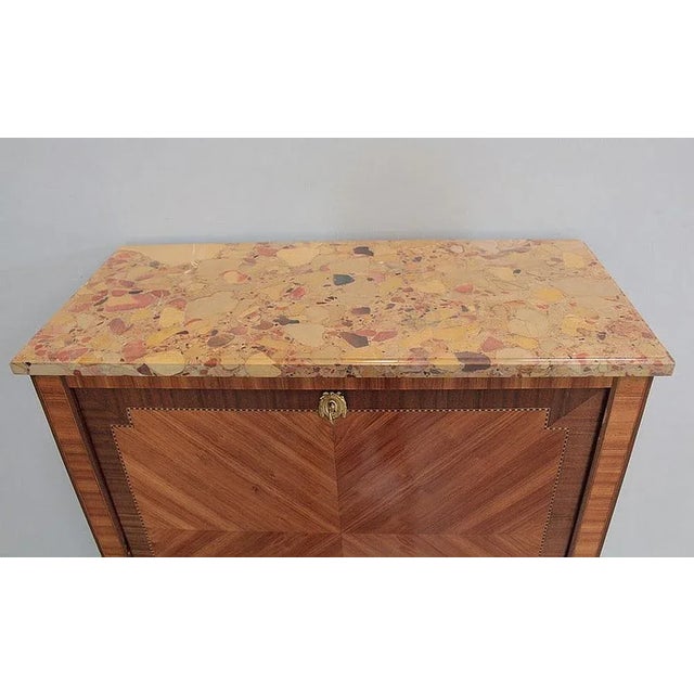 Louis XVI-Directoire style secretary in mahogany and rosewood veneer with ebony and lemon wood fillets decorated with...