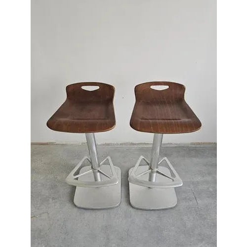 In this listing you will find a pair of minimalist postmodern Bar Stools designed by Joan Casas for Indecasa. They feature...
