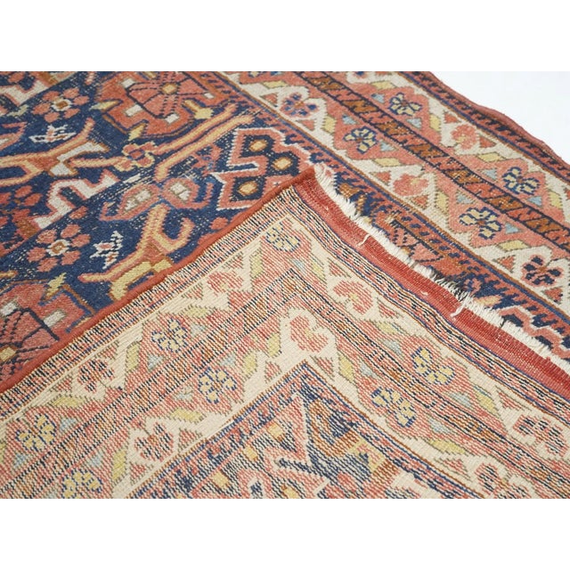 This cute SE Persian nomadic scatter features a sapphire indigo ground seven horizontal bands of rosettes, Maltese...