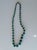 Graduated Malachite beaded 22". Purchased in the 70's from the Zaire (now the Congo). It is hand strung uniquely without a...