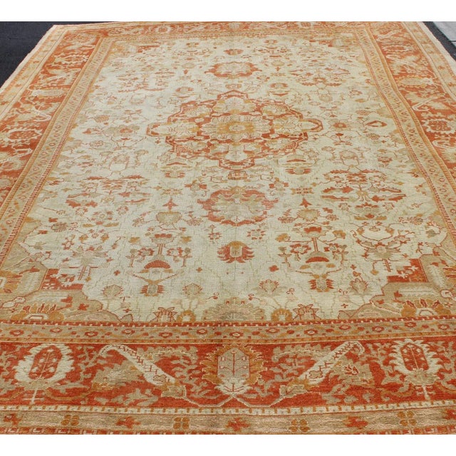 Antique Turkish Floral Oushak Rug in Cream, Rust Red, Orange and Green. Keivan Woven Arts/ Rug 17-0103, Origin/Turkey....