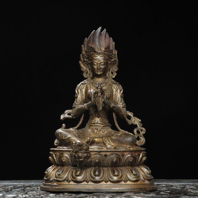This is a finely cast antique fire-gilded bronze statue of Vajrasattva, the primordial Buddha and central deity in...