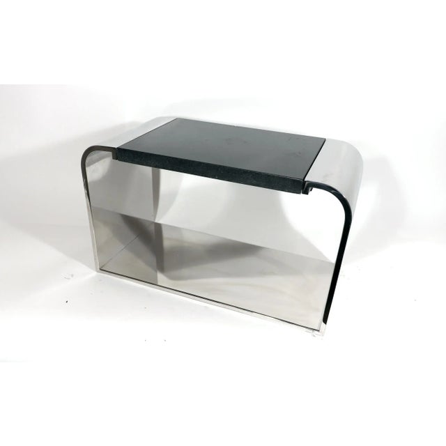 Stanley Jay Friedman for Brueton “Eclipse” Polished Steel and Black Granite Coffee Table American, Circa 1970–1980 Stanley...