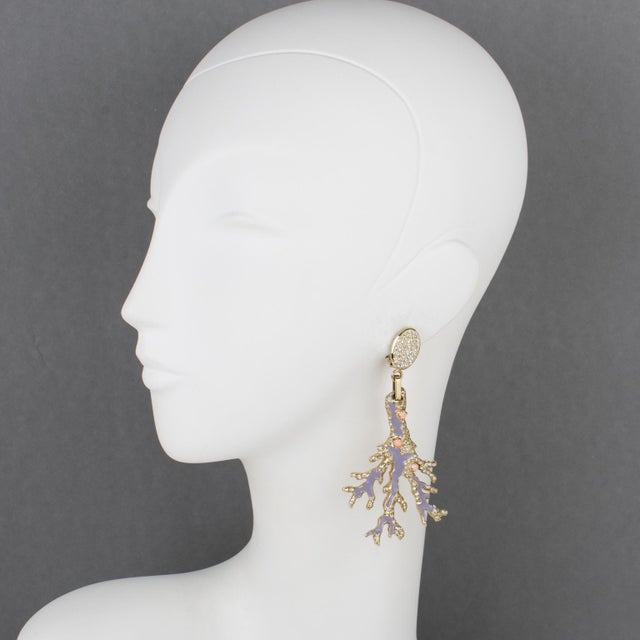 These mesmerizing Valentino Garavani jeweled clip-on earrings boast a pale gilded metal branch shape, ornate with faux-...