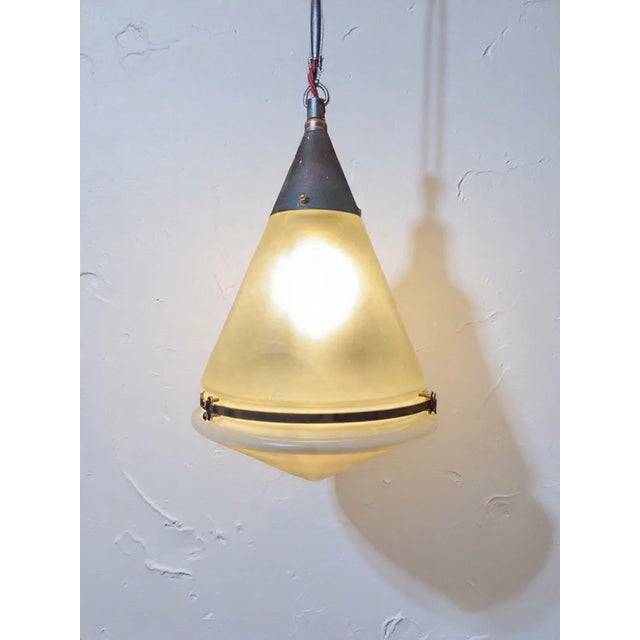 1920s luzette pendant light designed by renowned architect & designer peter behrens for siemens & schuckert. the lamp...