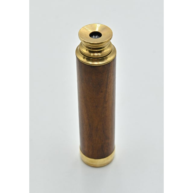 Vintage Telescope is a scientific object realized in the early 20th Century. A bronze telescope with glass lenses and...