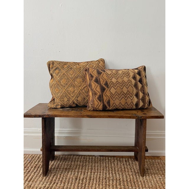 Kuba cloth is one of the most sophisticated textile traditions in the world. These hand-woven and embroidered raffia...