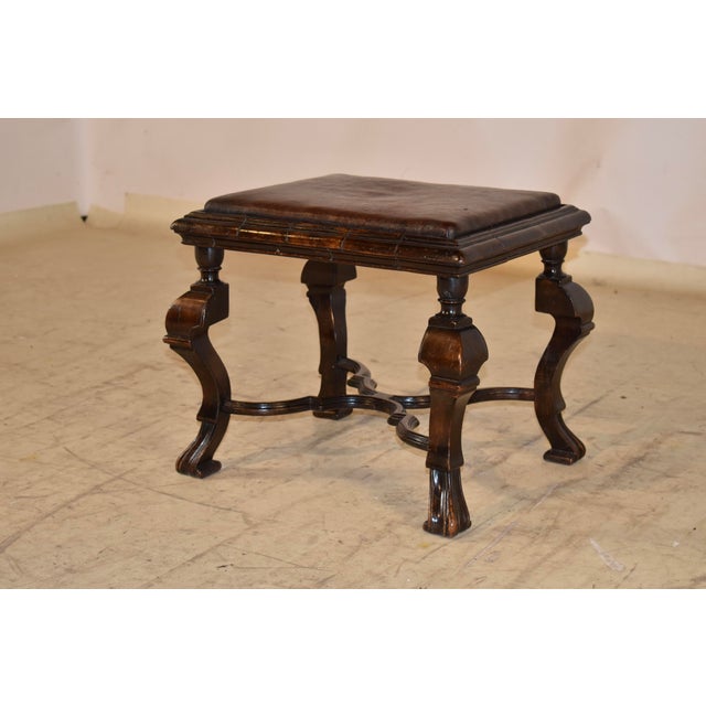 Wonderful and rare 17th century walnut stool from England. This is a very rare form with a cabriole and Spanish foot,...