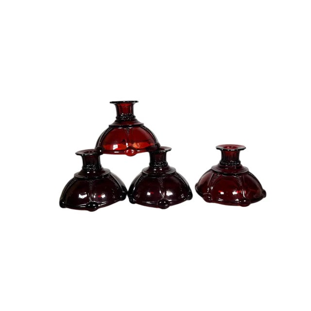 This is a stunning collection of four pieces of vintage ruby red glassware - made by Anchor Hocking from 1938-1940, these...