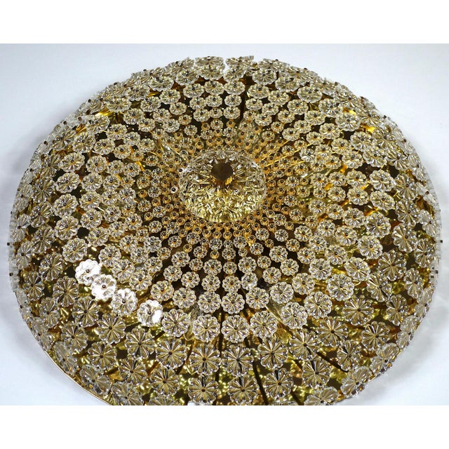 A beautiful ceiling light that boasts an impressive design when switched off and casts a lovely light onto the ceiling...
