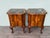 Pair of walnut bedside tables with finely crafted curved legs, embellished with elegant carvings and various details. The...