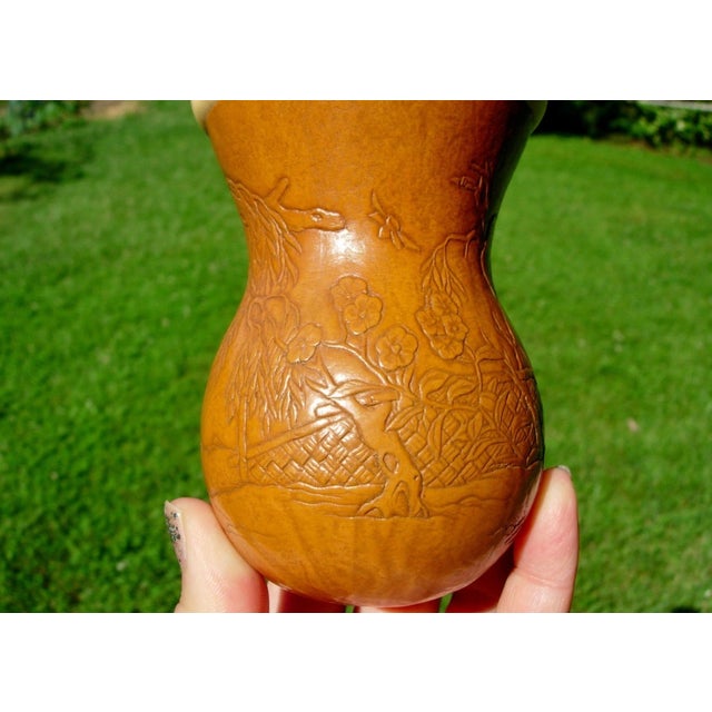 A fine and mellow antique Chinese gourd cricket cage with landscape scene, dating from the 18/19thc. The cage measures 5...