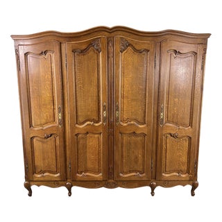 Vintage French Louis XVI Style Carved Oak 4-Door Armoire For Sale