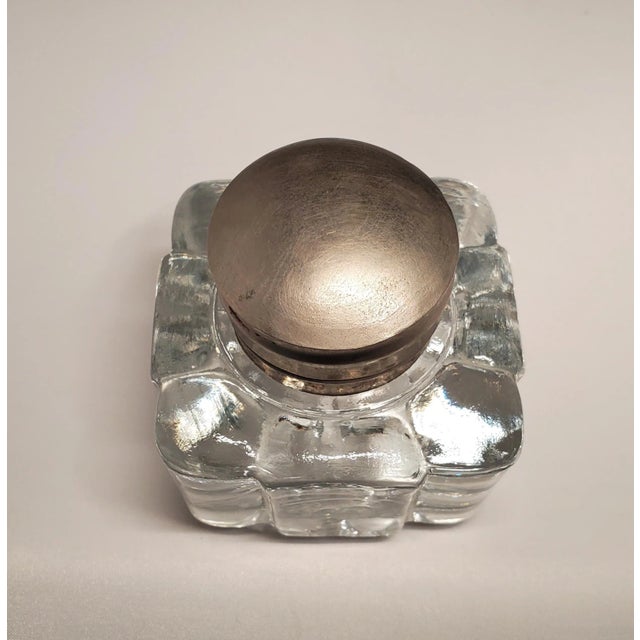 Heavy clean mid century crystal inkwell. Beautiful design that looks great from all sides. Its unique design incorporates...