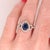This beautiful ring features a 1.14 carat blue sapphire gemstone with natural earth mined diamonds set in solid 14K gold....