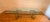 Stunning and elegant dining table. Replica of (model 6060) designed by Leon Rosen for the Pace Collection composed of a...