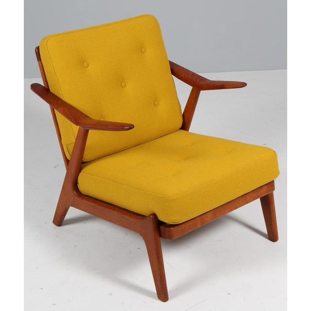 H. Brockman Petersen lounge chair in oak and teak. New upholstered with yellow Hallingdal wool from Kvadrat. Made by...