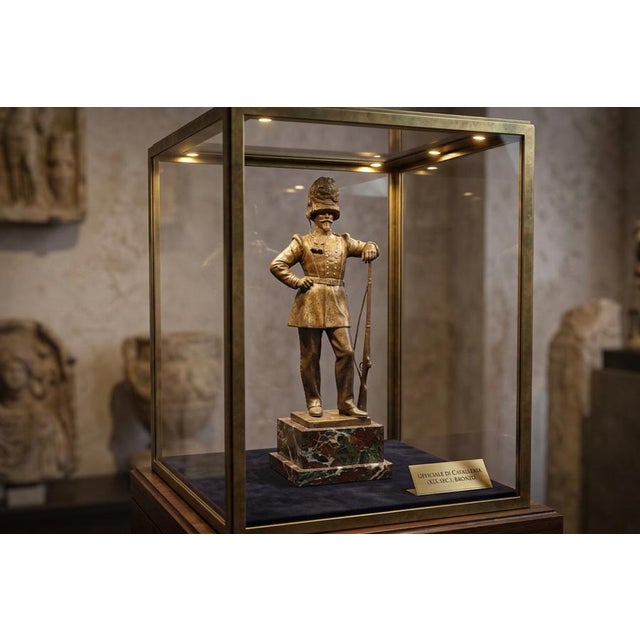 A fascinating, exquisitely crafted bronze sculpture depicting a military figure in period uniform. The work is an...