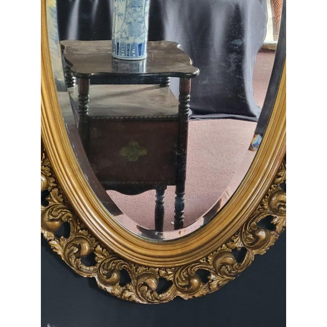 Early 1900s French Style Hand Carved Gilded Oval Beveled Wall Mirror For Sale - Image 11 of 12