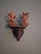 A set of three (3) pieces walnut wood with carved stags. A shelf with Stag head ,walnut wood. Two rare vase holders of...