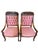 Elegant pair of Empire-style walnut armchairs featuring gracefully curved arms, carved turned arms supports, and rolled...