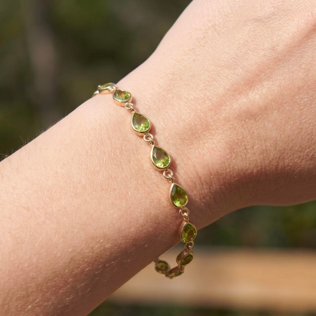 Elevate your everyday elegance with this exquisite gemstone station bracelet. Crafted with meticulous attention to detail,...