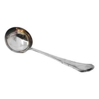 Silver Soup Ladle with Grooves Along the Handle For Sale